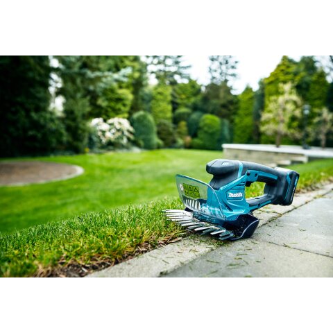 Makita UM600DSMEX Akku-Gras/Strauchschere 12V max. / 4,0 Ah, 2 Akkus + Ladegerät