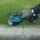 Makita DUM604RFX1 Akku-Grasschere 18V / 3,0 Ah, 1 Akku + Ladegerät inkl. Griffverlängerung mit Rolle EN